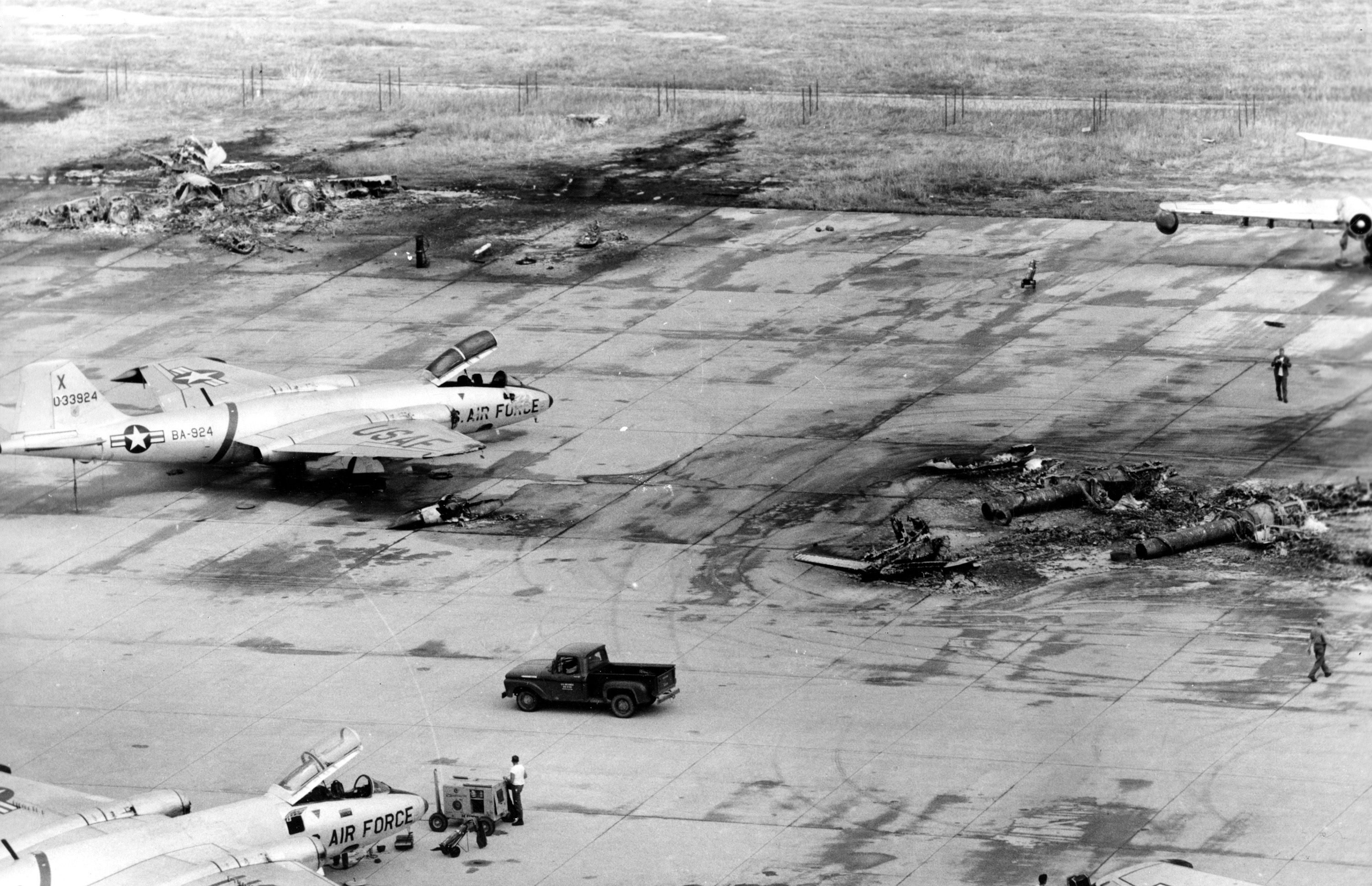 VIETNAM WAR ATTACK U.S. AIR BASE This is the view of the parking strip of a U.S. Air Base at Bien Hoa, near Saigon, South Vietnam, on November 1, 1964, after a mortar attack of the Communist Vietnamese forces. The attack left 4 American soldiers dead and 31 wounded, and caused heavy damage and destruction among the B 57 bombers parked on the field. (AP Photo)